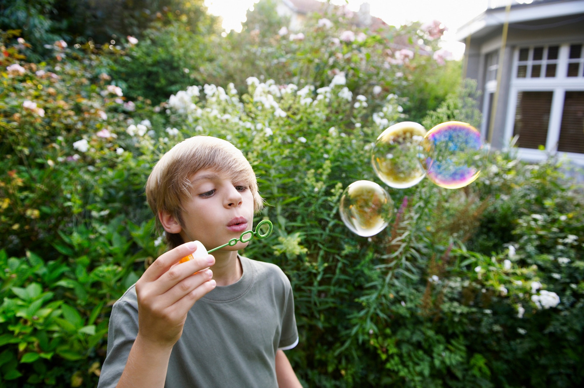 Boy blowing bubbles
